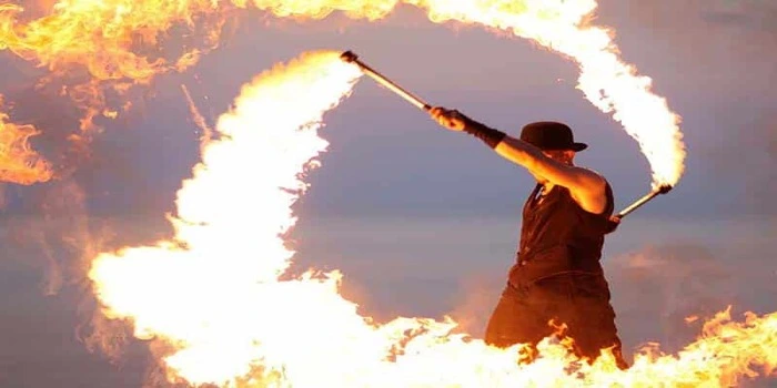 Fire breathing show at Dubai desert safari camp with cultural performances and night entertainment