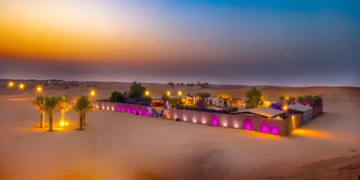 Desert Safari Dubai highlights showing red dunes, sunset, and camel rides