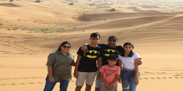 Desert safari in Dubai at sunset with red dunes, camel ride, and camping tents – travel diary experience