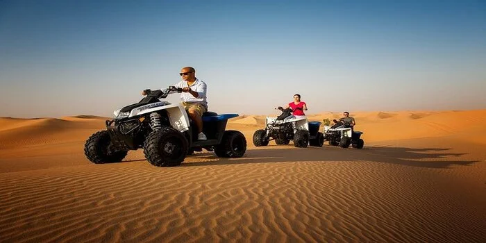 Desert safari Dubai tour showing dune bashing, camel ride and desert camp activities
